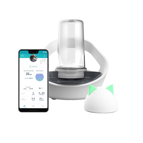 Sure Petcare Felaqua Connect water bowl next to smartphone showing Sure Petcare app