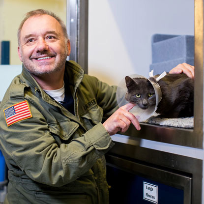 Bob Mortimer and cat DJ Loveham at Cats Protection