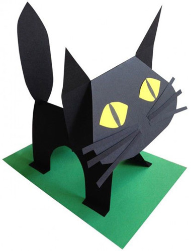 standing up black cat crafted out of paper