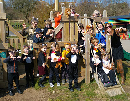 primary school class dressed as cats