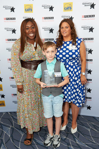 Winner of Hero Cat Award (Toby) Annette Sterland-Burton, her son Kieran and Chizzy Akudolu at the National Cat Awards 2018