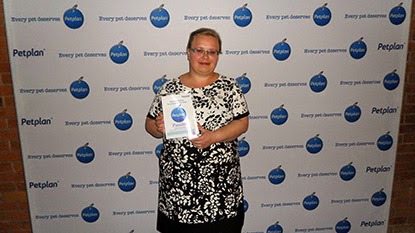 Cats Protection employee Claire Frangleton with award